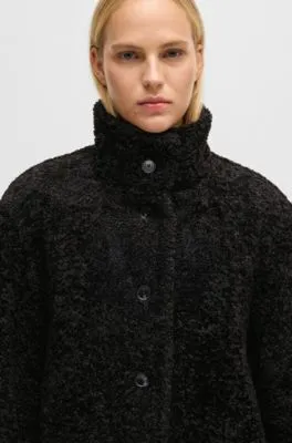 Teddy coat with patterned buttons